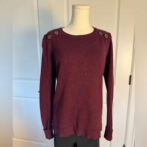 Women’s small knit sweater with button shoulder detail